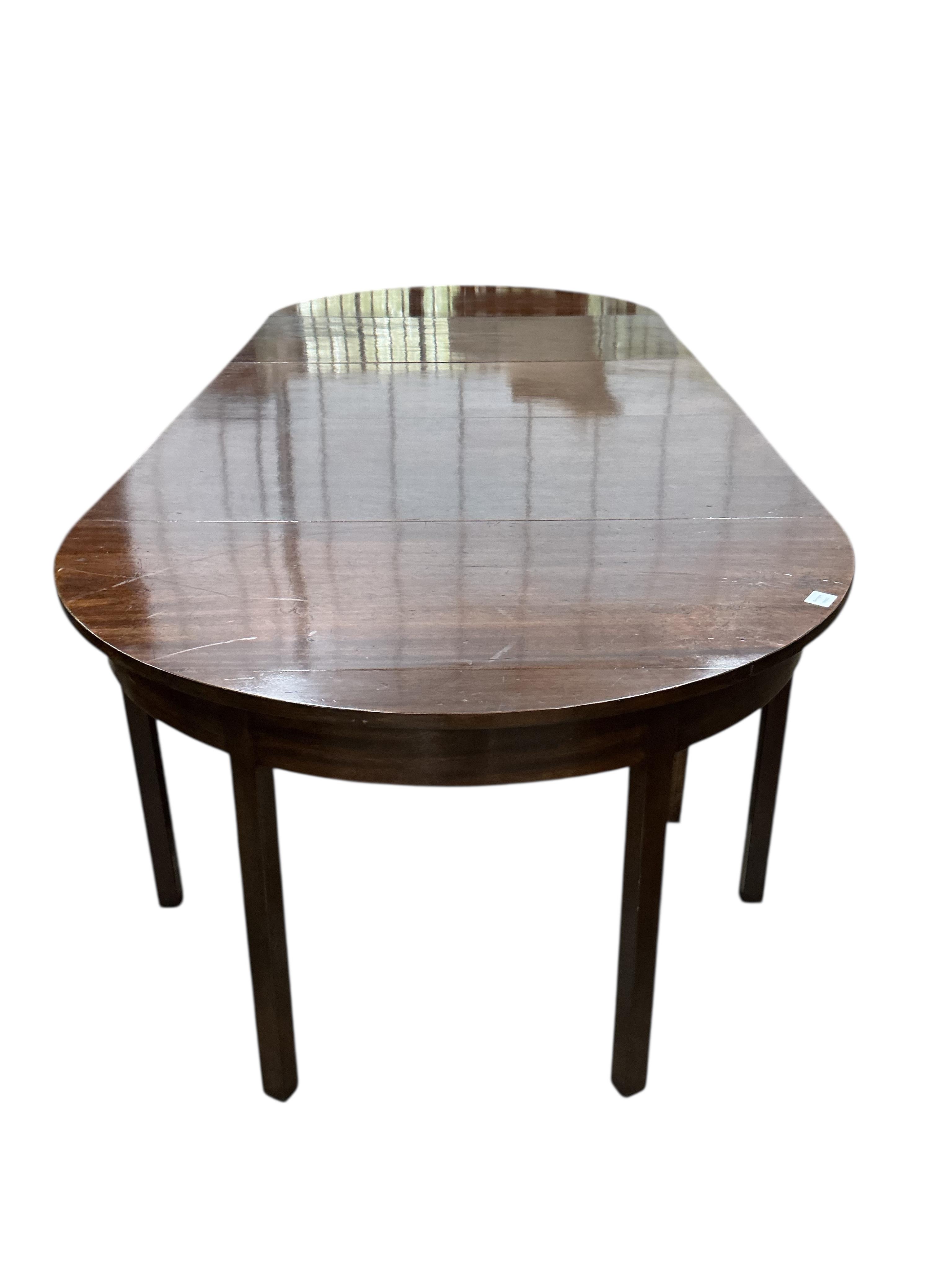 A George III style mahogany D end extending dining table incorporating some old timber, width 294cm extended, depth 122cm, height 73cm